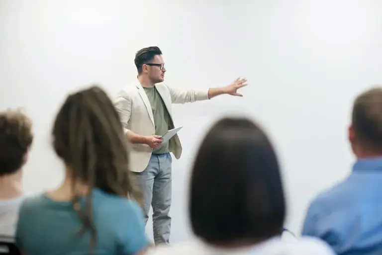 An MBA student leads a case method classroom discussion